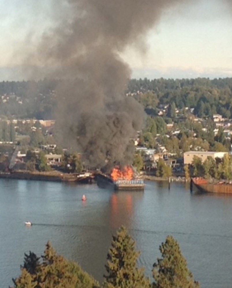  Flames can be seen from high ground in New Westminster. Photograph By MATT LORENZI