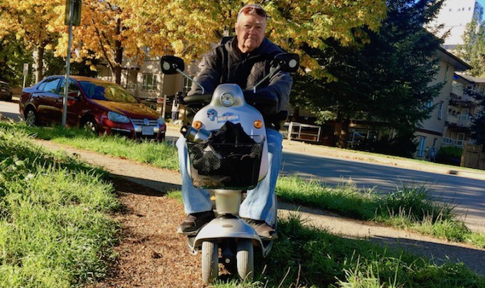  Wayne McQueen has to navigate Smith Avenue on his scooter where, in places, there are no curb letdowns. (Photograph By Maria Rantanen)