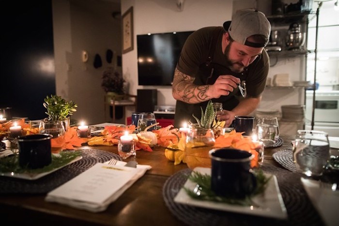  Chef Travis Petersen uses a dropper to add THC distillate to an amuse bouche of toasted farro and young pine broth before guests arrive for a multi-course cannabis-infused meal, in Vancouver, on Thursday October 11, 2018.THE CANADIAN PRESS/Darryl Dyck