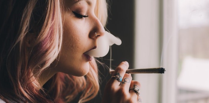  Smoking cannabis indoors/Shutterstock
