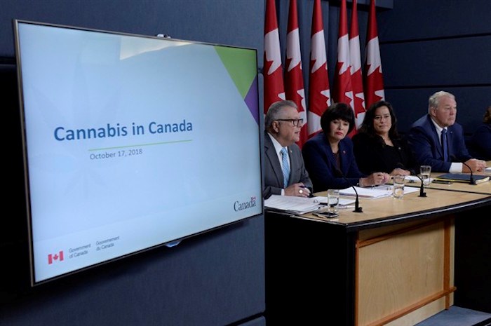  Ralph Goodale (left to right), Minister of Public Safety and Emergency Preparedness, Ginette Petitpas Taylor, Minister of Health, Jody Wilson-Raybould, Minister of Justice and Attorney General of Canada, and Bill Blair, Minister of Border Security and Organized Crime Reduction, attend a news conference on the Cannabis Act in Ottawa, Wednesday, Oct.17, 2018. THE CANADIAN PRESS/Adrian Wyld