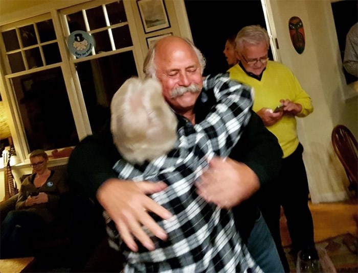  Mayor-elect Gary Ander hugs re-elected councillor Alison Morse after all the vote results come in.