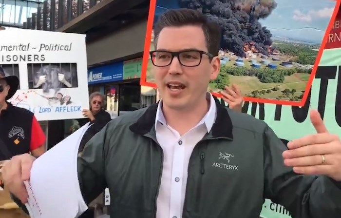  MP Terry Beech speaks to protesters Wednesday. (Burnaby Now)