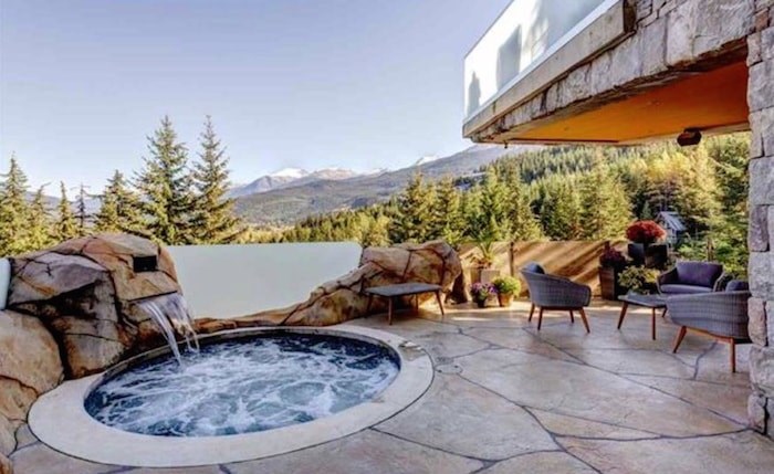 The hot tub on the view terrace is perfect for apres-ski relaxation, especially with that waterfall. Listing agent: Viive M. Truu