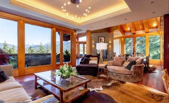  The lounge area of the great room makes the most of those mountain views. Listing agent: Viive M. Truu