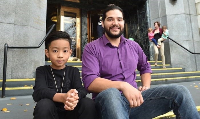  R.J. Pena and Landon Thatcher outside city hall on Friday afternoon. They were recognized for their bravery in the face of an East Vancouver house fire. (Photo by Dan Toulgoet).