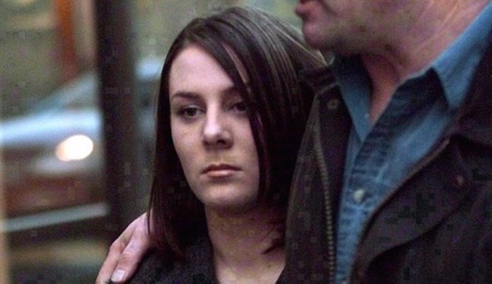  Kelly Ellard and her father Lawrence leave the Vancouver courthouse, March 30, 2000. THE CANADIAN PRESS/ Adrian Wyld