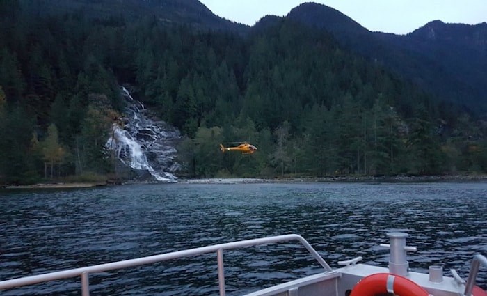  Royal Canadian Marine Search and Rescue volunteers and members of North Shore Rescue and Coquitlam Search and Rescue move in to rescue a person who spent more than a week in the backcountry. photo supplied, Royal Canadian Marine Search and Rescue