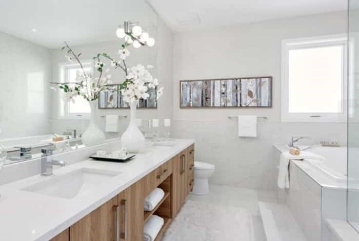  The master bathroom is modern, clean and white without being clinical. Listing agents: Shawn Wentworth, Tom Malpass, Tara Hunter