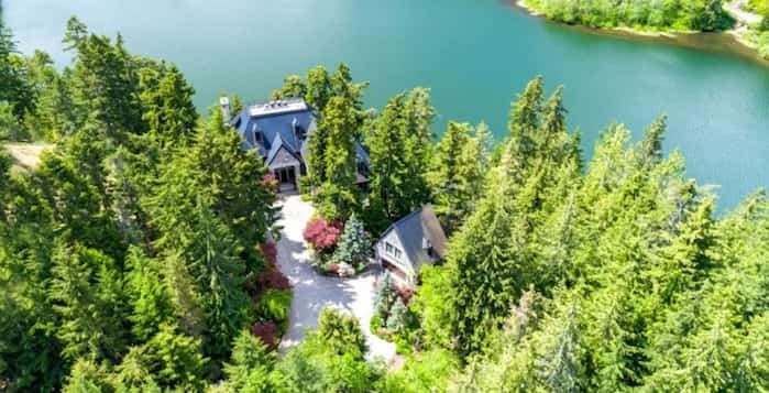  Chateau du Lac on Nita Lake in Whistler has been relisted for $19,888,000 with a new listing agent, Christopher Bradley. Source: Concierge Auctions.