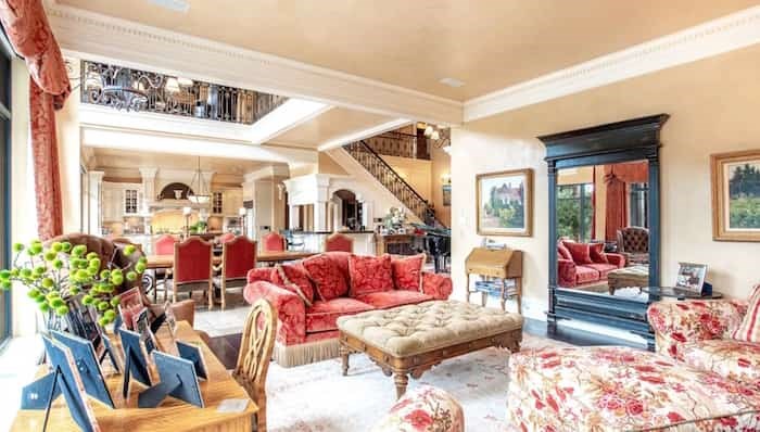  nlike a real French chateau, this family- and entertaining-friendly home has a great room that combines living, dining and kitchen areas. Source: Concierge Auctions