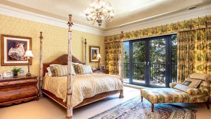  This master bedroom would hardly seem complete without a four-poster bed such as this one. Source: Concierge Auctions