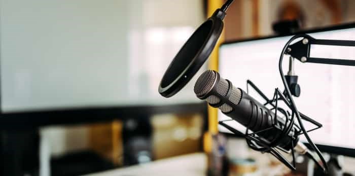  Close-up image of microphone in podcast studio / Shutterstock