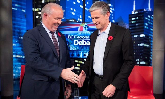  Premier John Horgan and Liberal leader Andrew Wilkinson following the Electoral Reform Debate at Global Television in Burnaby, B.C. Thursday, Nov., 8, 2018. THE CANADIAN PRESS/Jonathan Hayward