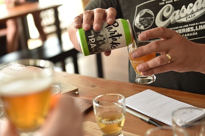  Trying out several non-alcoholic beers (Photo by Dan Toulgoet)