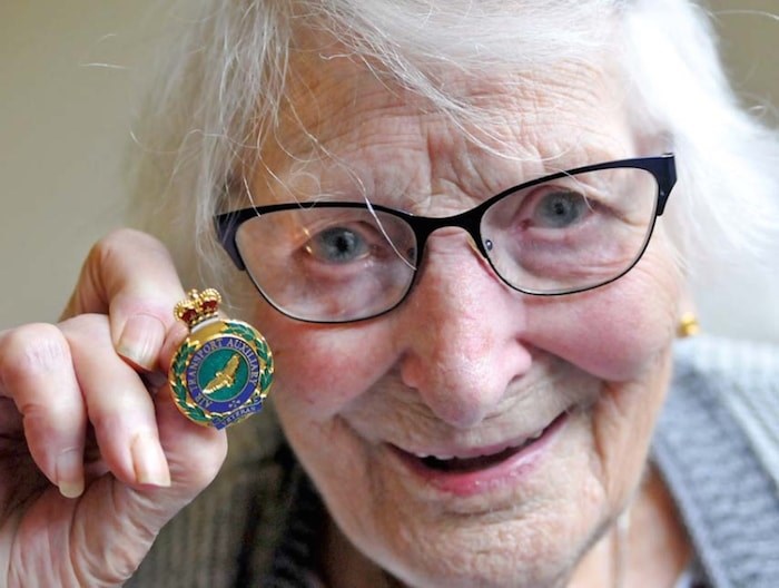  Jaye Edwards proudly displays her Air Transport Auxiliary pin, a memento from her time flying fighter planes and bombers during the Second World War. photo Paul McGrath, North Shore News