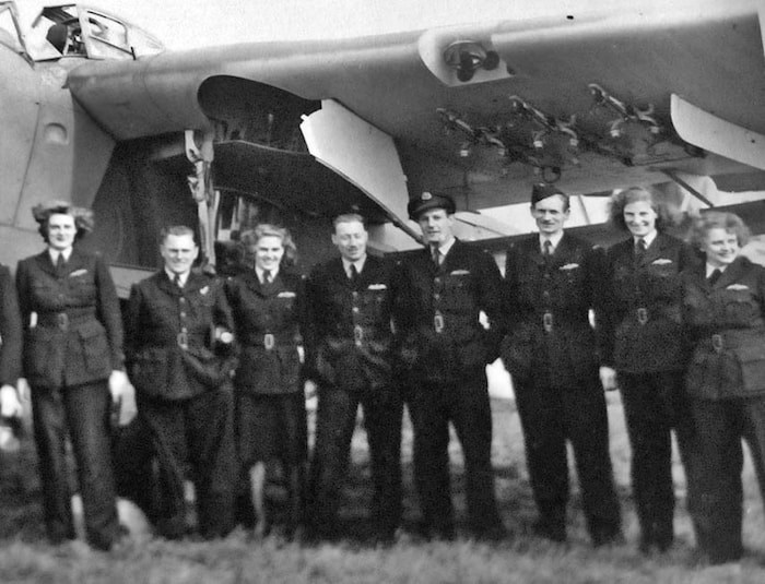  Edwards stands second from the right under the wing of a Barracuda bomber. Photo supplied