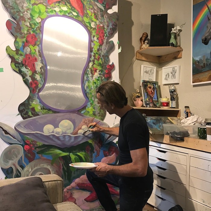  Canadian surrealist artist Michael Abraham is handpainting props and backdrops for the musical. Photo: Children's Theatre of Richmond Association