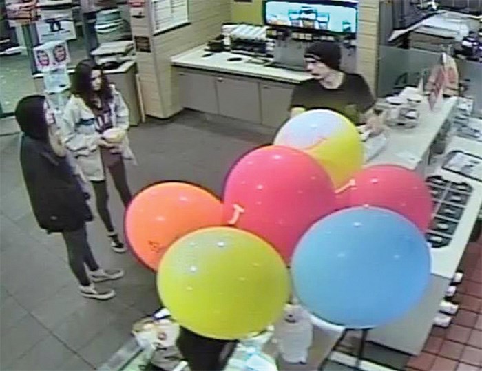  North Vancouver RCMP are hoping to identify the people in this video image. On the evening of Nov. 7 someone stole jewelry, sunglasses and a wallet containing a credit and debit card, then used the cards to buy food at the Lynn Valley McDonald's. photo supplied North Vancouver RCMP
