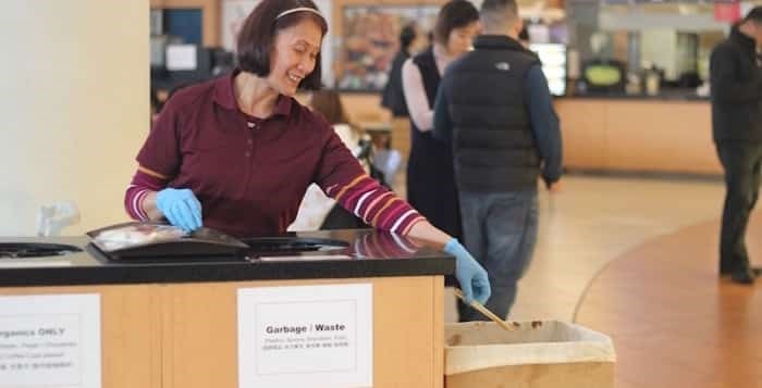  Janitorial staff at Aberdeen Centre help sort chopsticks from food court trays. Photo: Alyse Kotyk