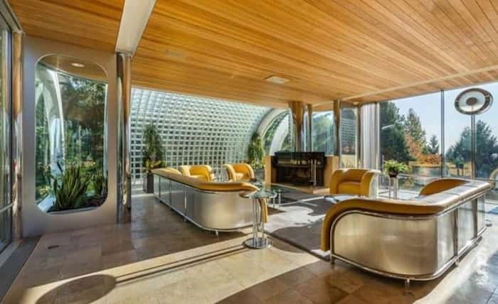  The spectacular living room comes complete with original furniture designed by Arthur Erickson especially for this house. Listing agent: Eric Latta