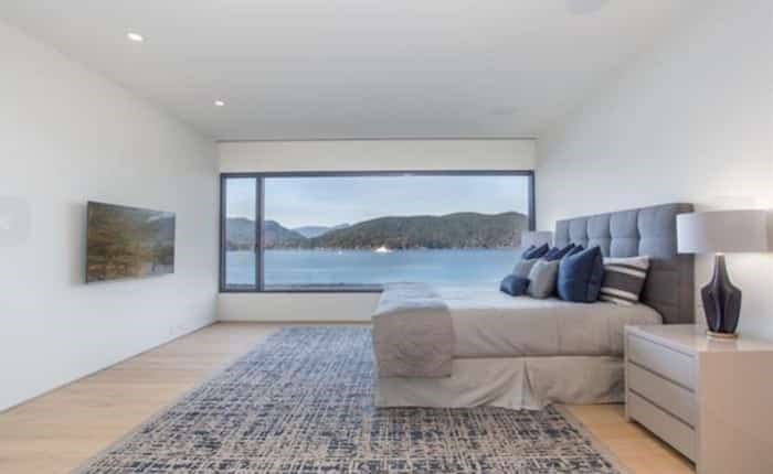 With views like that from the master bedroom, taking in the ocean, passing ferries and Bowen Island, there's no need for a TV. Listing agent: Geoff Taylor