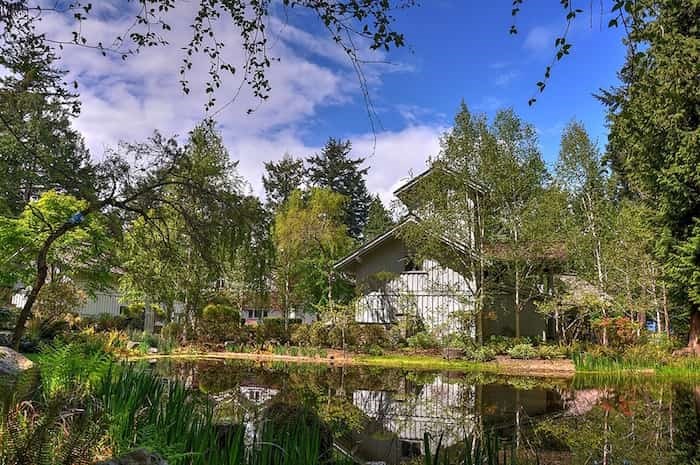  For added serenity, the main home has a reflective pond adjacent to it. Image supplied by Engel & Völkers