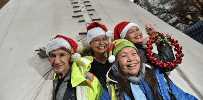  Downtown Eastside Market workers Curtis, Linda Lennie and Janet Charlie with executive director Constance Barnes. Photograph By DAN TOULGOET