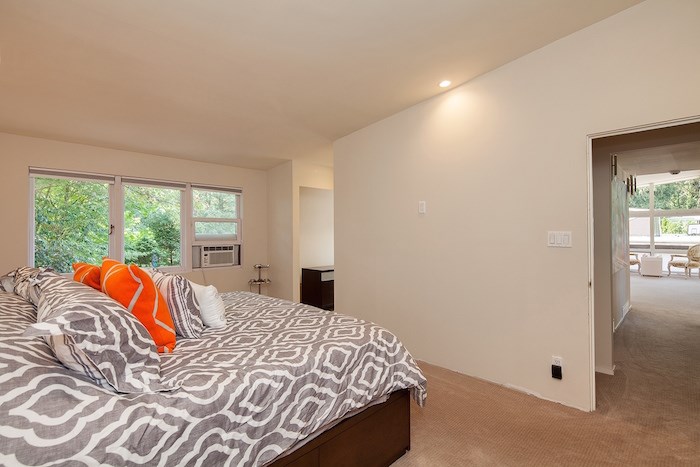  The master bedroom is fairly simple and not huge, but it does come with an ensuite bathroom and leafy backyard views. Image supplied