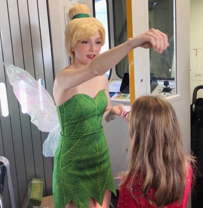  Tinkerbell sprinkled all the kids with fairy dust and told them to think good thoughts before the plane took off. Photo Jessica Kerr