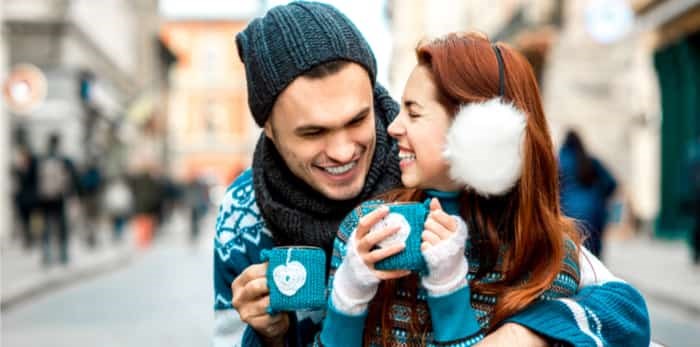  couple laughing in winter / shutterstock