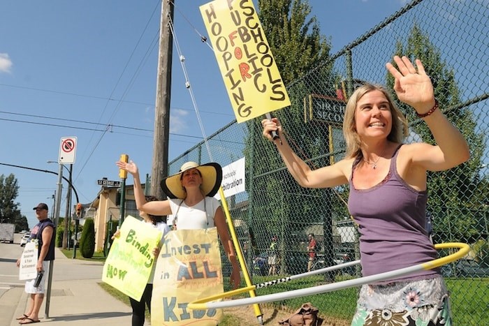  In 2014, Vancouver teachers joined educators across the province on the picket line as schools closed for five weeks over parts of two school years. Photo Dan Toulgoet