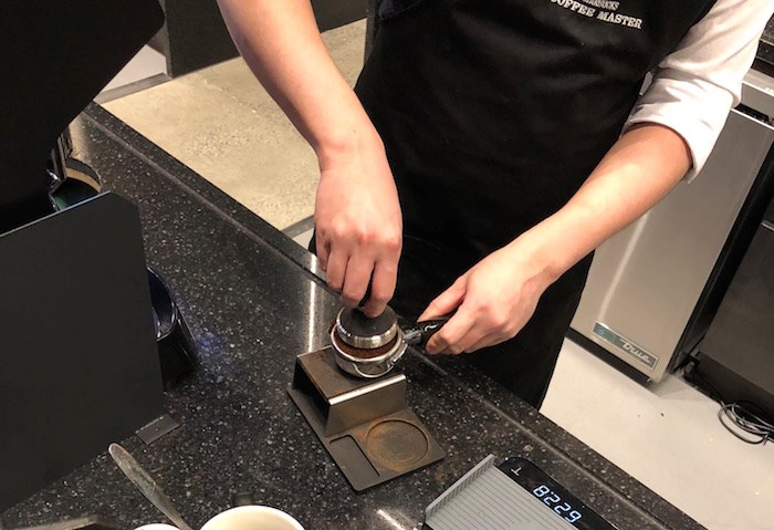  Tamping a shot for pulling on the Black Eagle espresso machine (Lindsay William-Ross/Vancouver Is Awesome)