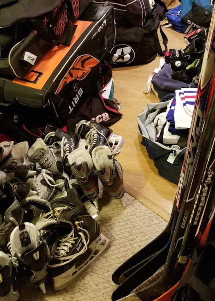  Donated hockey equipment is shown in Vancouver high school hockey coach Todd Hickling's basement in a handout photo. Hickling gathered donations and used gear to remove the cost barrier for kids to play hockey. THE CANADIAN PRESS/HO-Todd Hickling