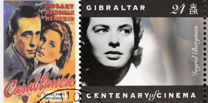  GIBRALTAR - CIRCA 1995. A postage stamp printed by GIBRALTAR shows Swedish actress Ingrid Bergman and American actor Humphrey Bogart starring in the film Casablanca, circa 1995 / Shutterstock