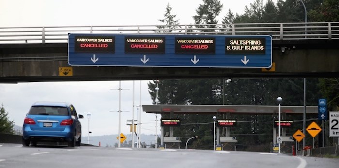  Signs at Swartz Bay ferry terminal announce cancelled sailings on Thursday, Dec. 20, 2018. Photo by Adrian Lam/Times Colonist