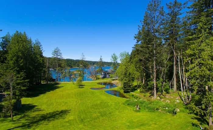  The nearly 10-acre estate has a four-hole golf course as well as two private deep-water docks and a helipad. Listing agent: Clarence Debelle