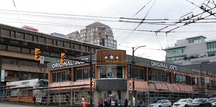  A seven-storey, mixed-use building is slated to replace the Original Joe’s corner site at Cambie Street and West Broadway. Photo Rob Kruyt