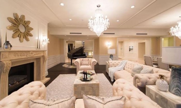  The formal living area has a very grand fireplace for keeping you cozy. Listing agent: Wendy Tian