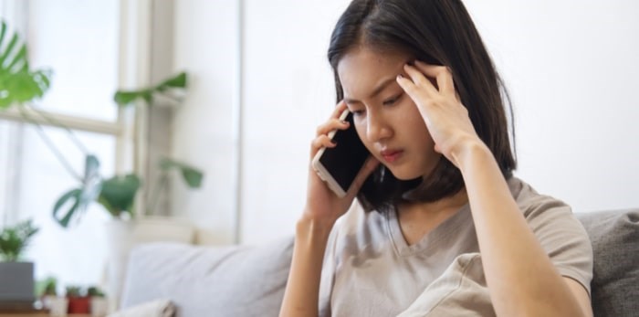  A new phone scam has fraudsters posing as VPD officers and CRA officials. Photo: Stressful phone call/Shutterstock