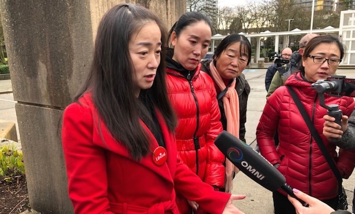  Karen Wang was still wearing a Liberal campaign button on Jan. 17. Photo by Chris Campbell