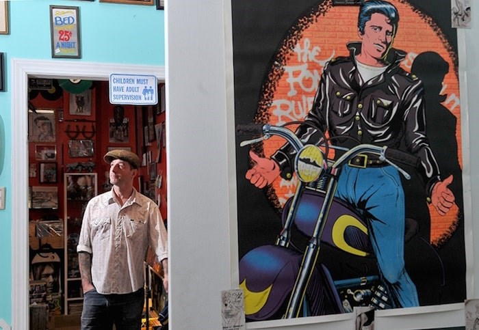   Johnny Barnes surveys his domain of Pinball Alley Vintage, the record room that contains more than 5,000 vinyl record albums, along with some 8-track music cassettes and VHS movies. Photo by Mario Bartel/Tri-City News