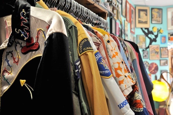  Shirts — from cowboy to Hawaiian to Canada Customs — on a rack at Pinball Alley. Photo by Mario Bartel/Tri-City News