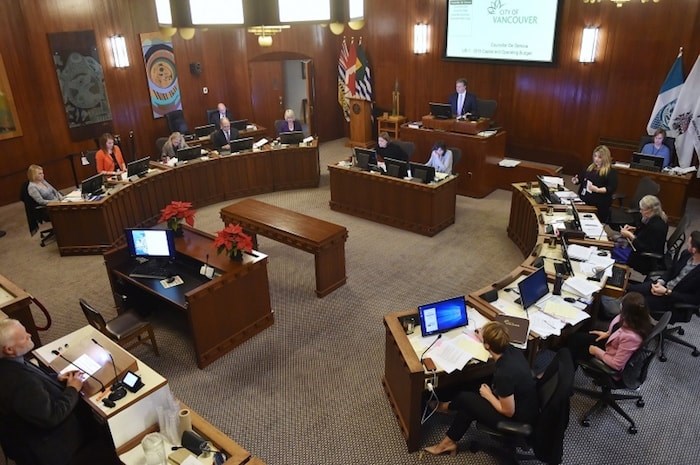  鶹ýӳcity council at work in the chamber at city hall. Photo Dan Toulgoet