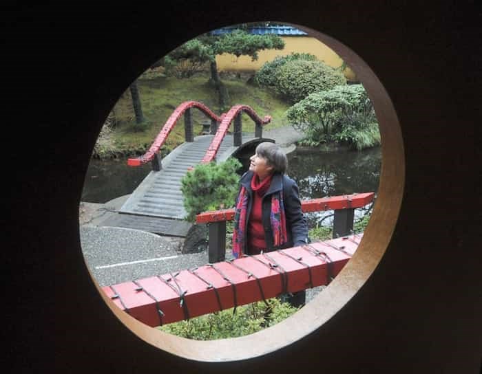  Adrienne Brown, who is part of the city’s Garden Review Board, strolls through Park & Tilford Gardens, which is celebrating its 50th anniversary this year. Brown’s father, Harry Webb, designed the gardens in the 1960s - photo Mike Wakefield, North Shore News