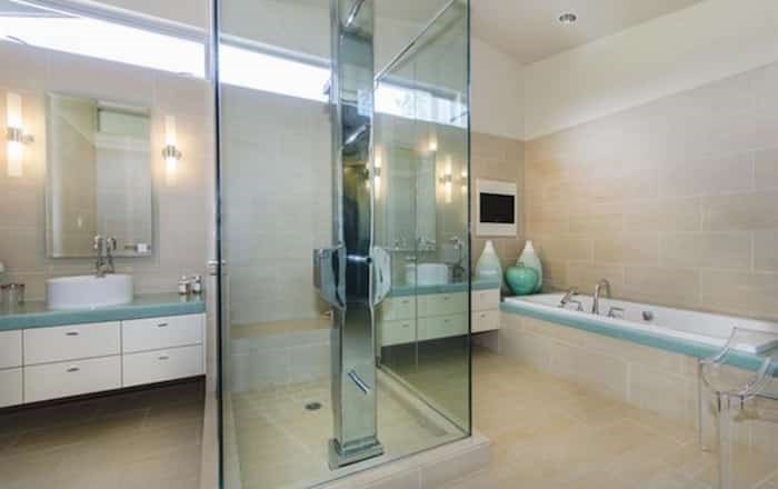  The striking master bathroom has a steam shower between the dual vanities. Listing agent: Manyee Lui