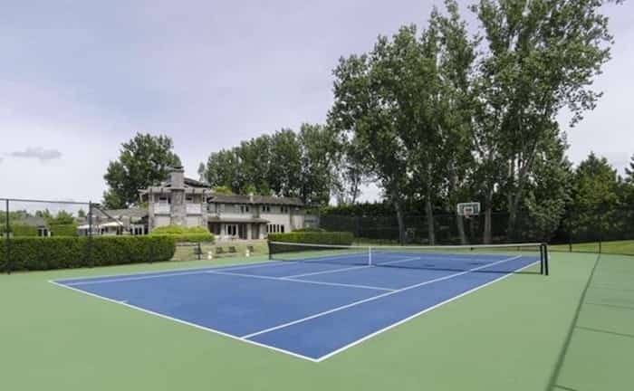  When you have 19 acres to play with, a full-size tennis court is a must. Listing agent: Manyee Lui