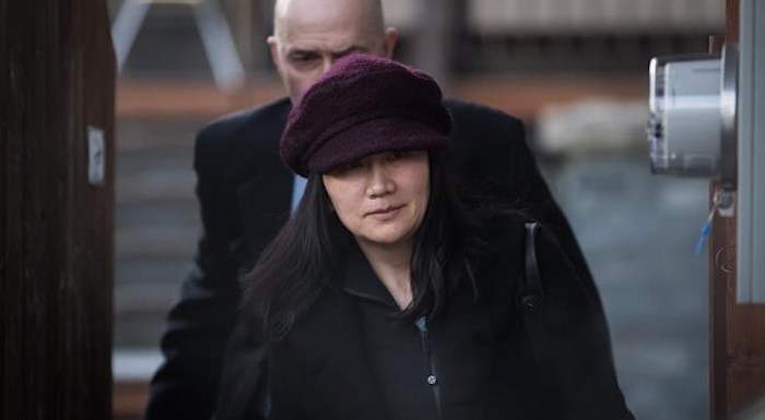  Huawei chief financial officer Meng Wanzhou, who is out on bail and remains under partial house arrest after she was detained Dec. 1 at the behest of American authorities, leaves her home to attend a court appearance regarding her bail conditions, in Vancouver, on Tuesday January 29, 2019. THE CANADIAN PRESS/Darryl Dyck