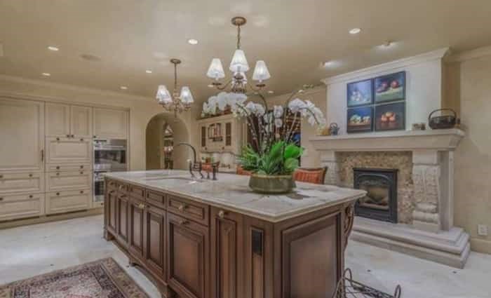  The kitchen is updated but still in keeping with the home's historic, ornate, European style. Listing agent: Harry Kramm