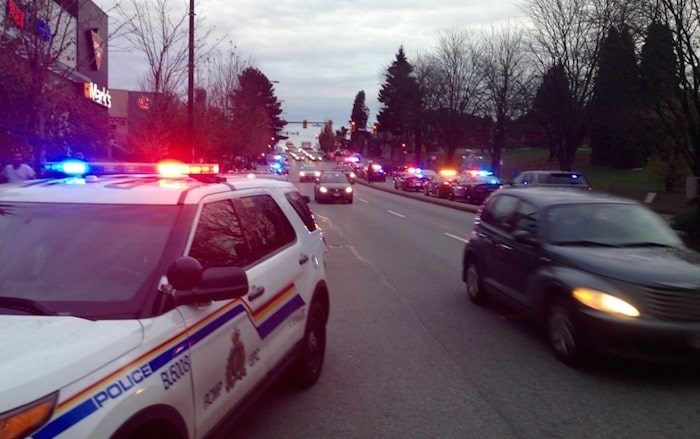  Dozens of police officers from Vancouver and the RCMP rushed to a Canadian Tire store on Grandview Highway Nov. 10, 2016 to respond to reports of a man robbing the store. Police killed the man outside the store’s front door. Photo by Mike Howell